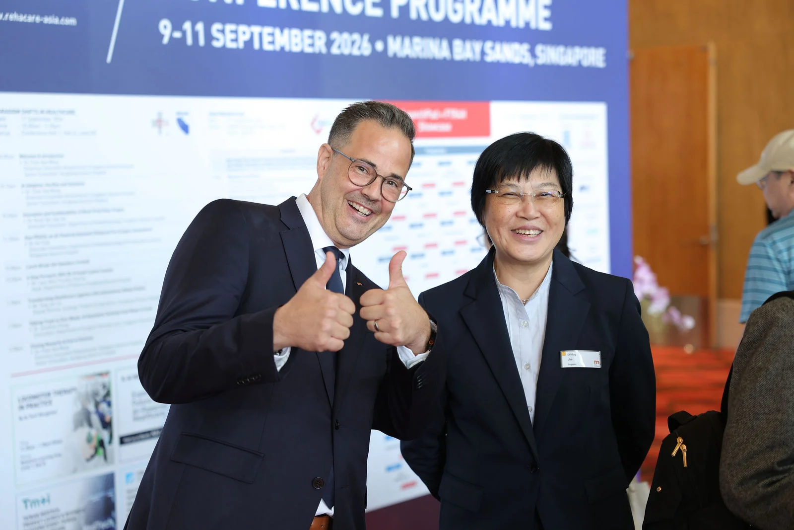 Delegates at the conference wall